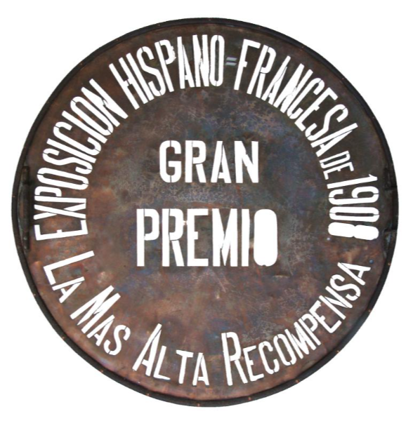 Premio de la Exposición Hispano-Francesa de 1908 otorgado a Arbara, símbolo de calidad centenaria en la producción de aceite de oliva virgen extra.